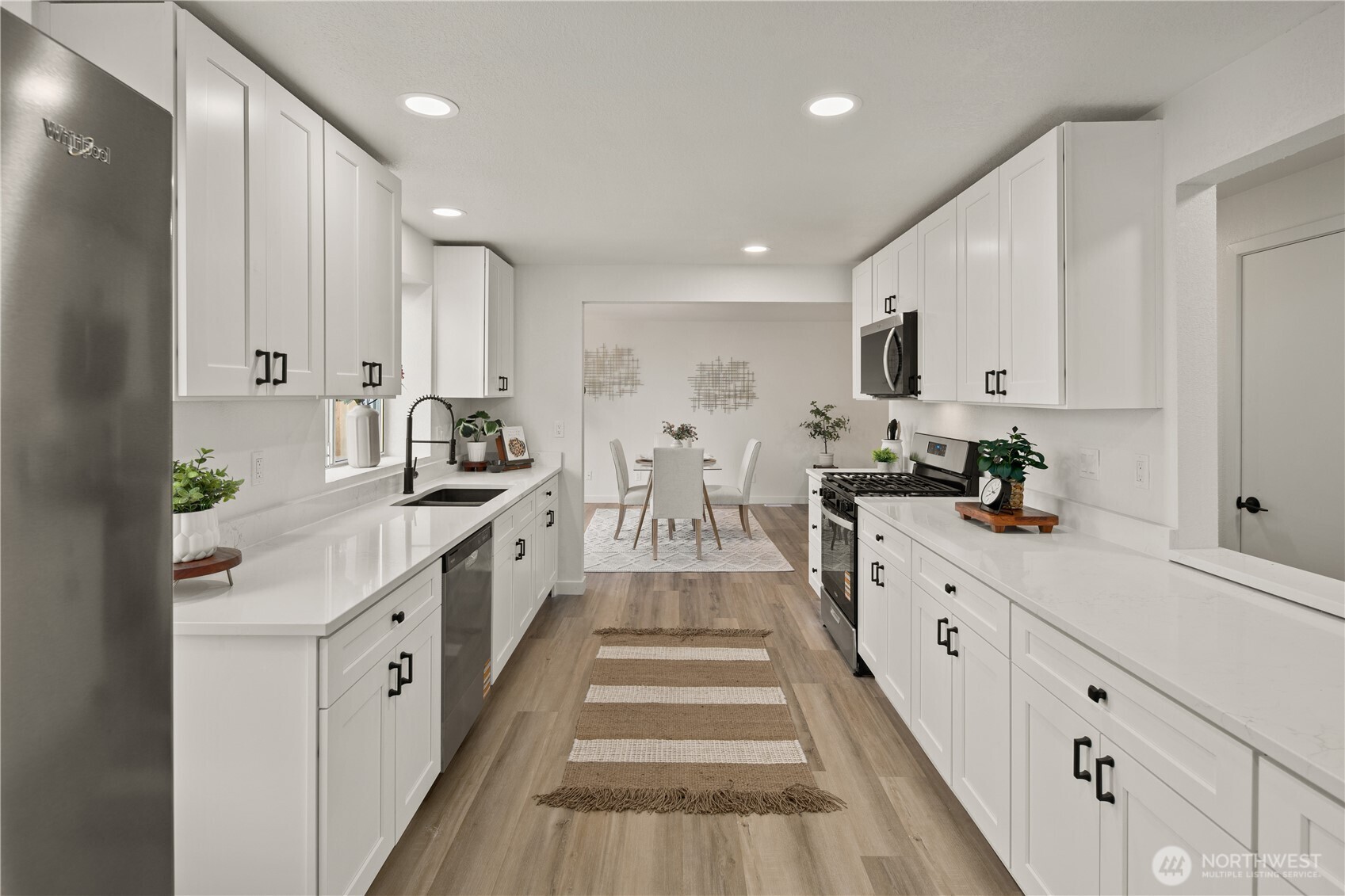 18307 130th Avenue Southeast Renton, WA 98058 - Photo 14 of 36 a large kitchen with cabinets