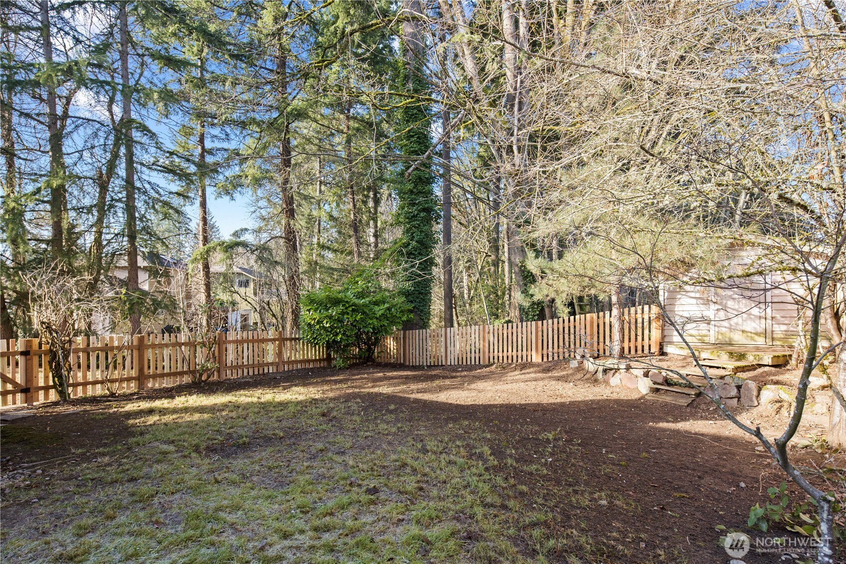 18307 130th Avenue Southeast Renton, WA 98058 - Photo 34 of 36 a view of outdoor space with large trees