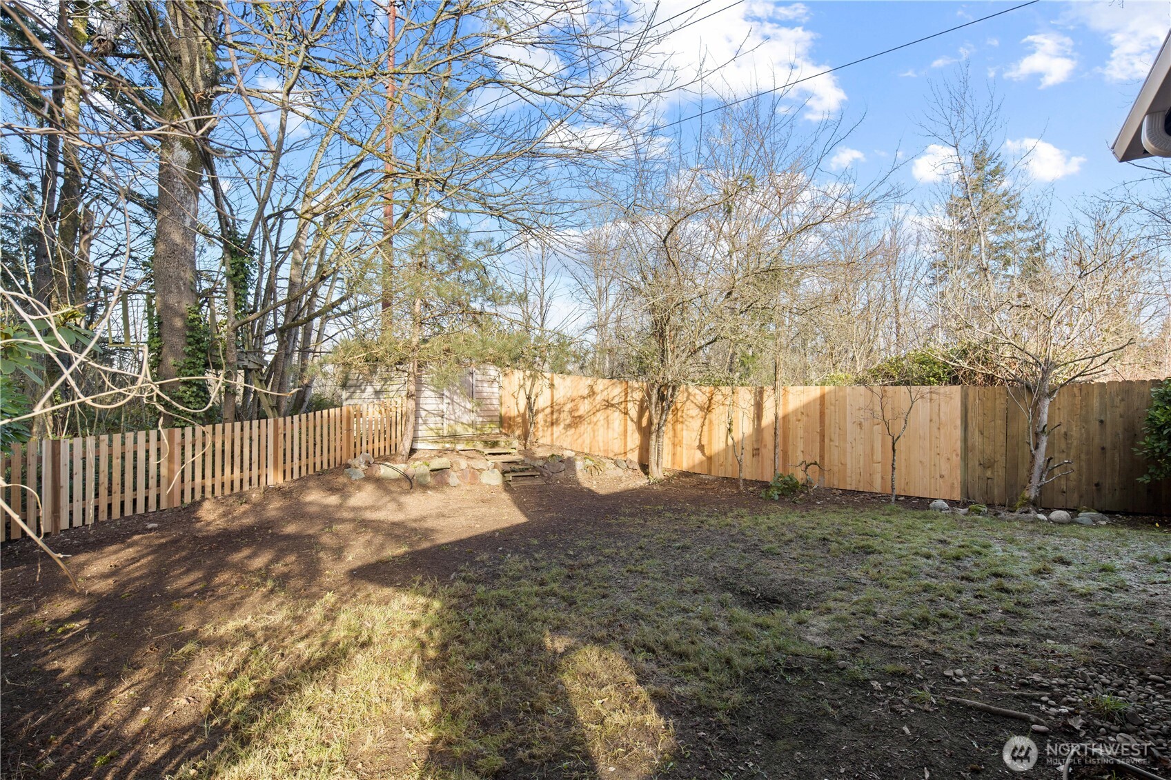 18307 130th Avenue Southeast Renton, WA 98058 - Photo 35 of 36 a view of a yard with trees