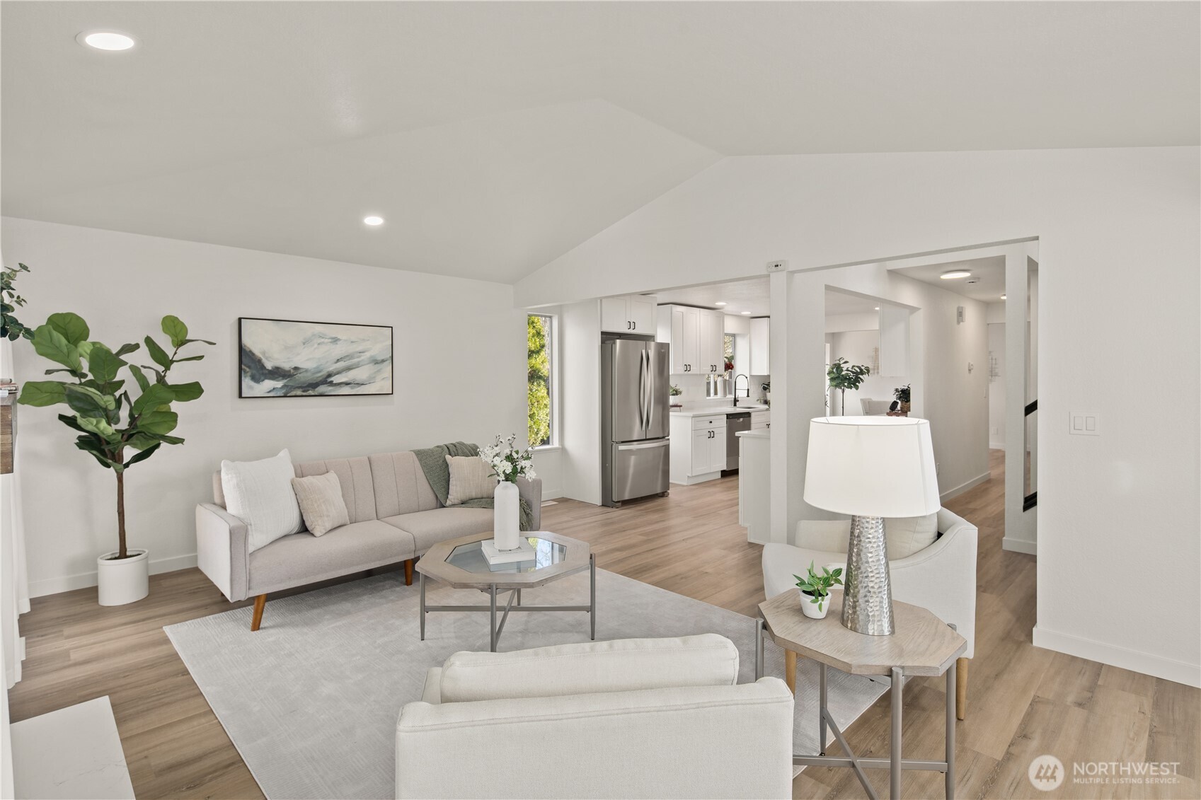 18307 130th Avenue Southeast Renton, WA 98058 - Photo 9 of 36 a living room with furniture and white walls