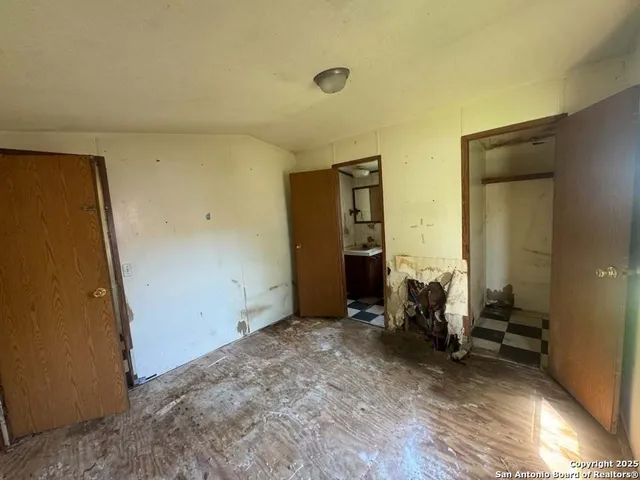 wooden floor and chair in a room