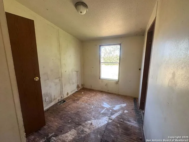 an empty room with windows