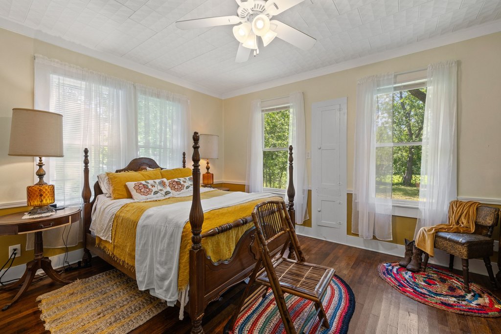 807 Cecelia Street Taylor, TX 76574 - Photo 16 of 24 a bed room with a bed and a couch