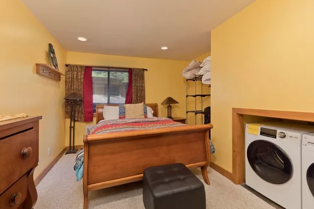 a view of a house with a tree