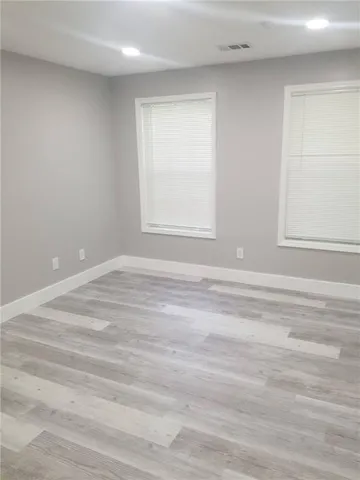 a view of a room that has a window in it