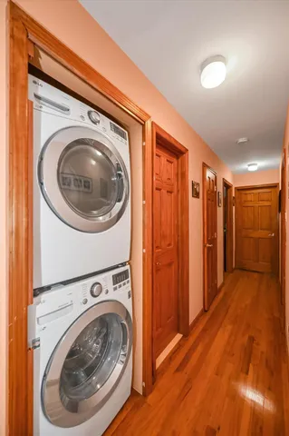 a view of a hallway with washer and dryer