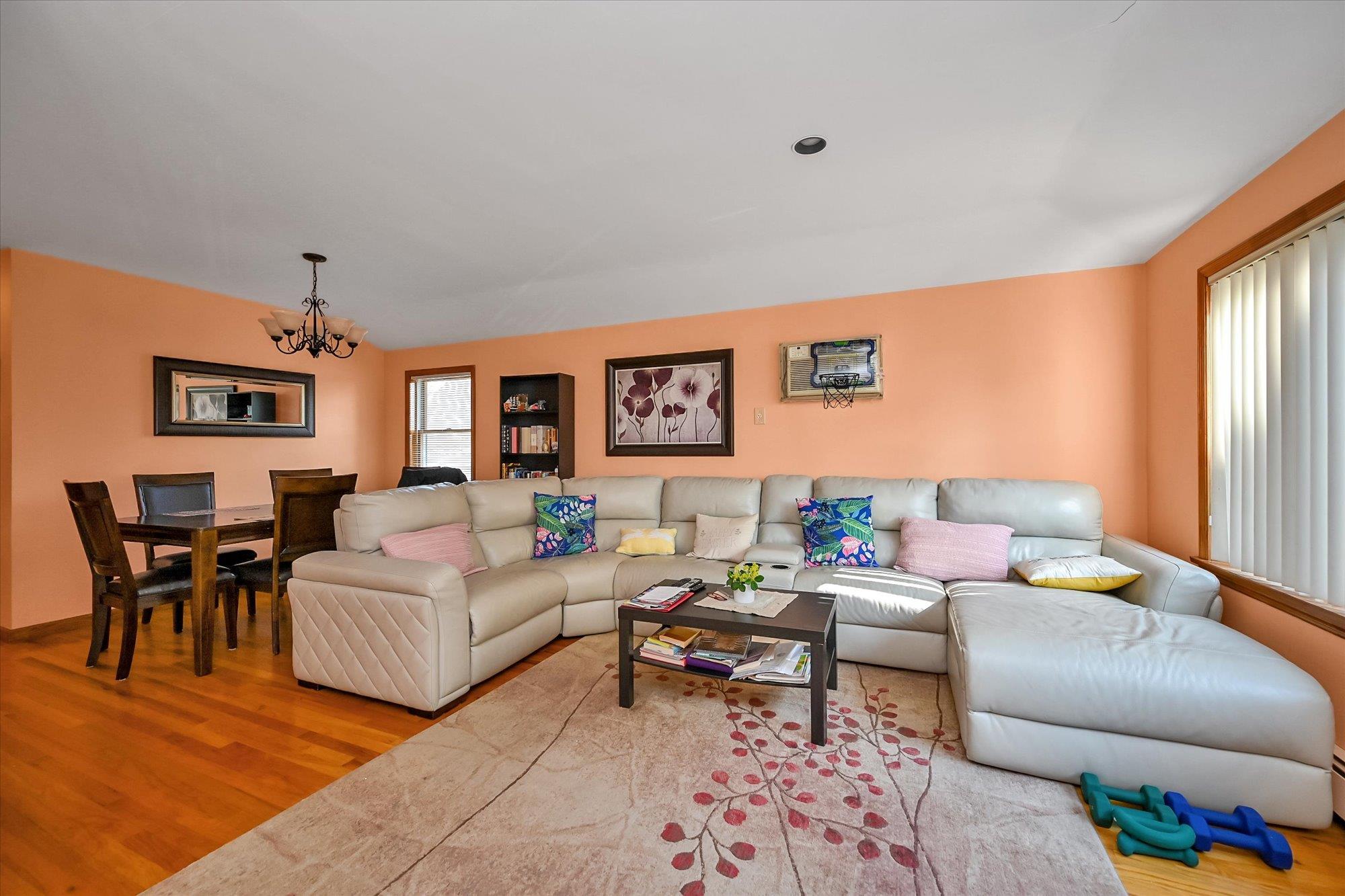45-39 192nd Street Queens, NY 11358 - Photo 4 of 23 a living room with furniture a rug and a window