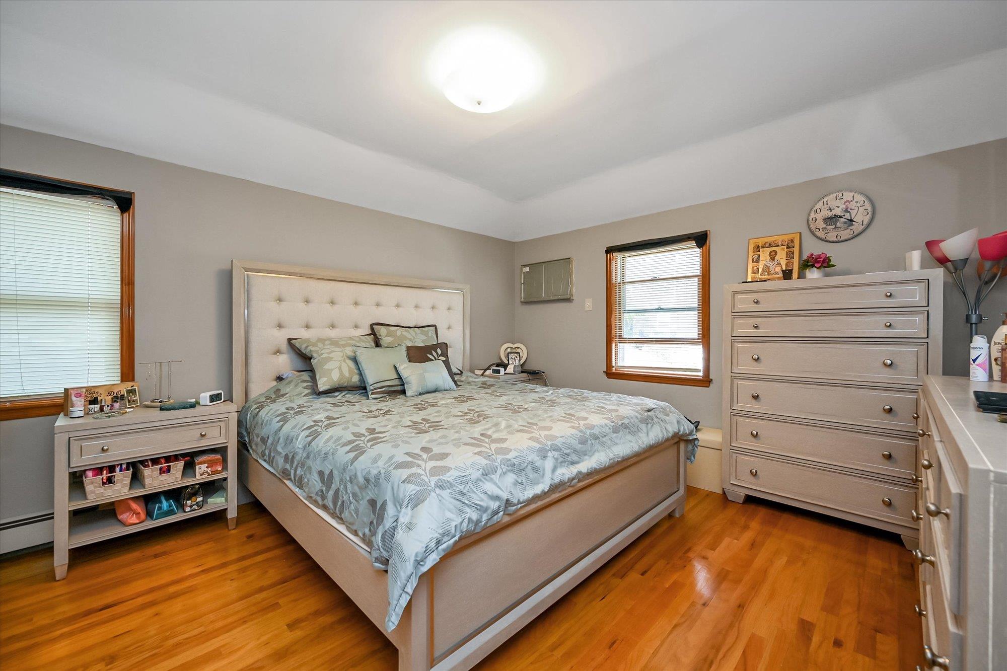 45-39 192nd Street Queens, NY 11358 - Photo 7 of 23 a bedroom with a bed and a window