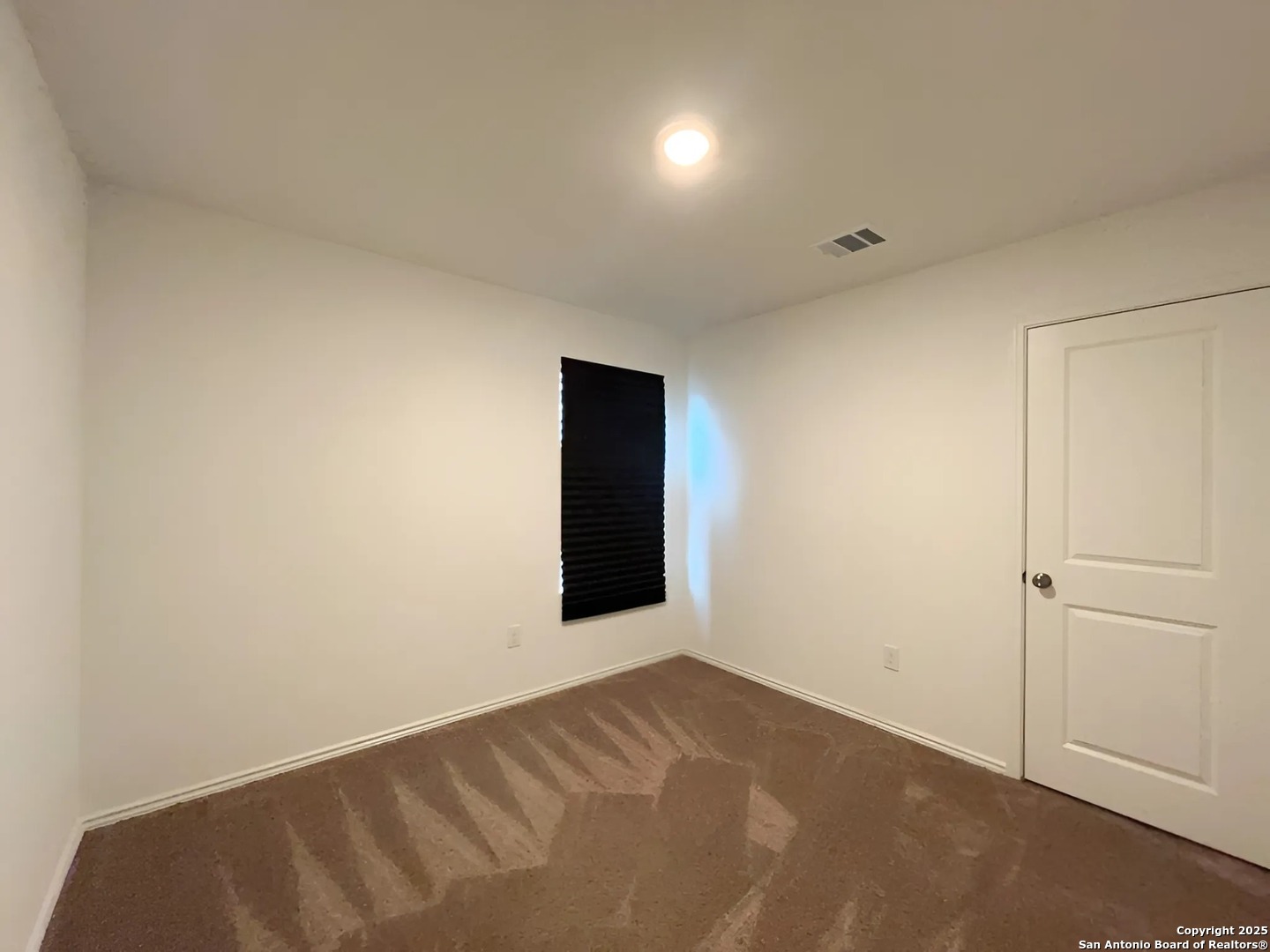6954 Biotite Ridge Elmendorf, TX 78112 - Photo 19 of 39 a view of an empty room