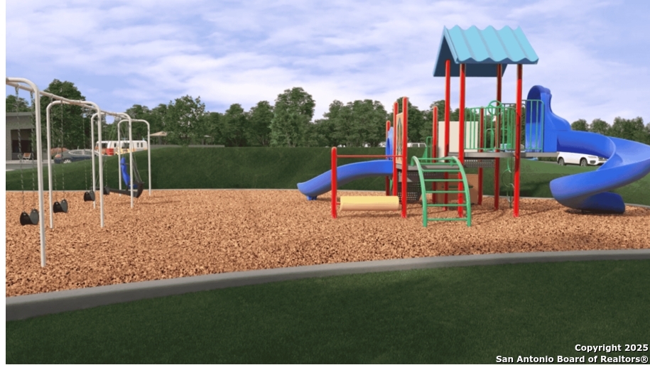 6954 Biotite Ridge Elmendorf, TX 78112 - Photo 37 of 39 a view of a park with slide
