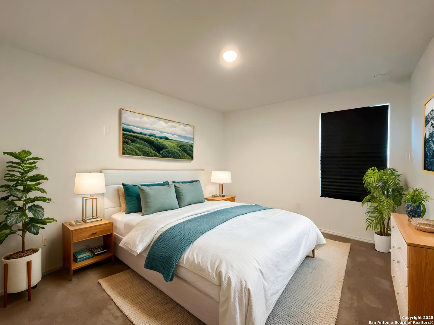 6954 Biotite Ridge Elmendorf, TX 78112 - Photo 4 of 39 a bedroom with bed and a potted plant