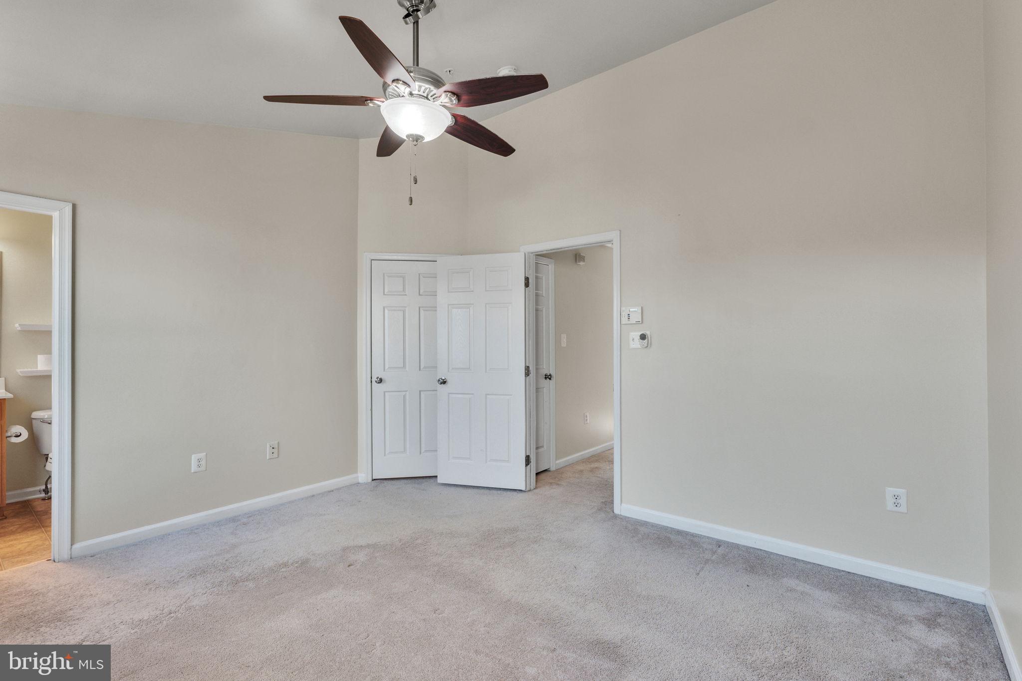 25501 Joy Lane Damascus, MD 20872 - Photo 23 of 35 an empty room with chandelier fan
