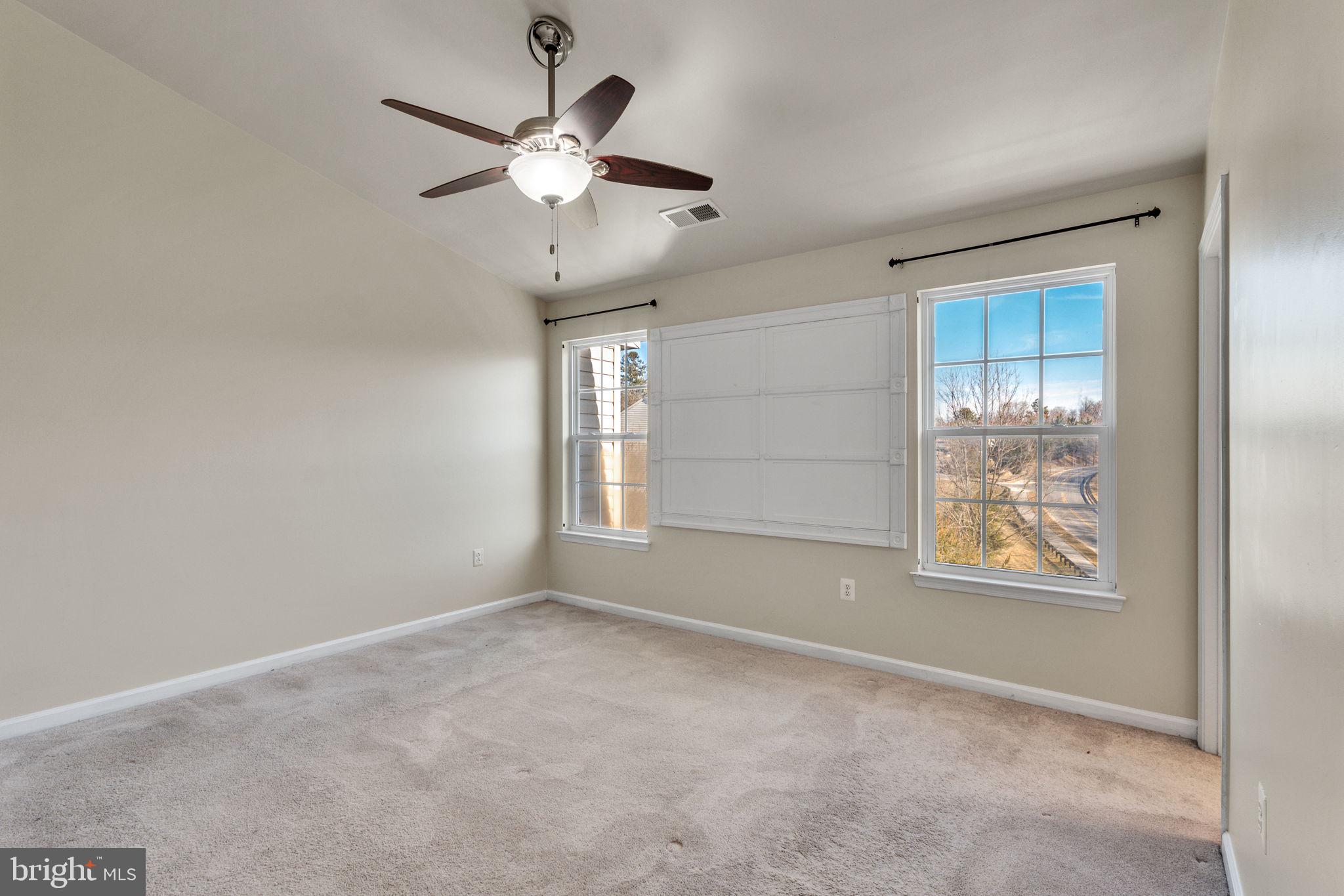 25501 Joy Lane Damascus, MD 20872 - Photo 24 of 35 a view of an empty room with a window
