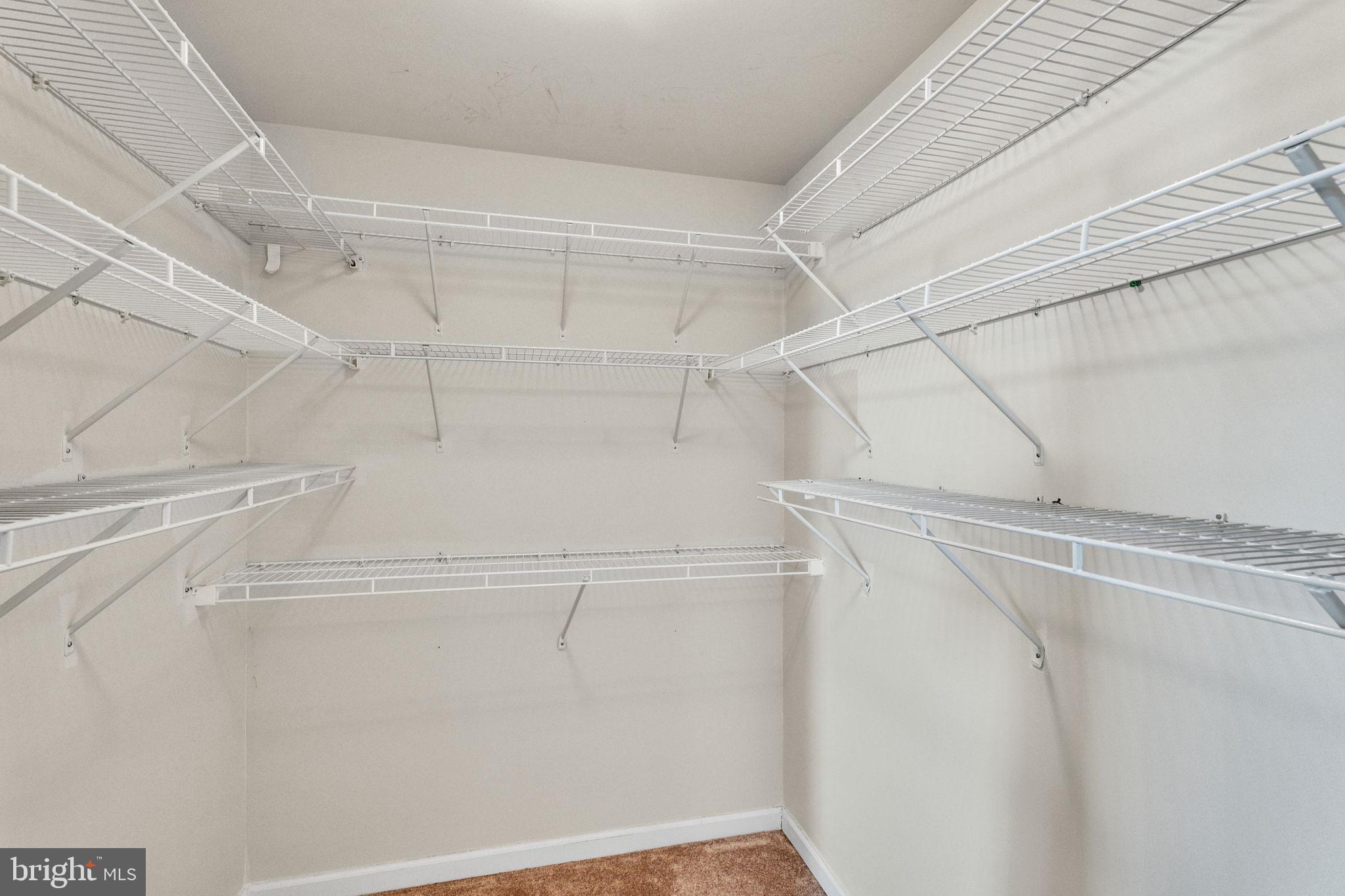 25501 Joy Lane Damascus, MD 20872 - Photo 27 of 35 a view of a room with racks on the wall