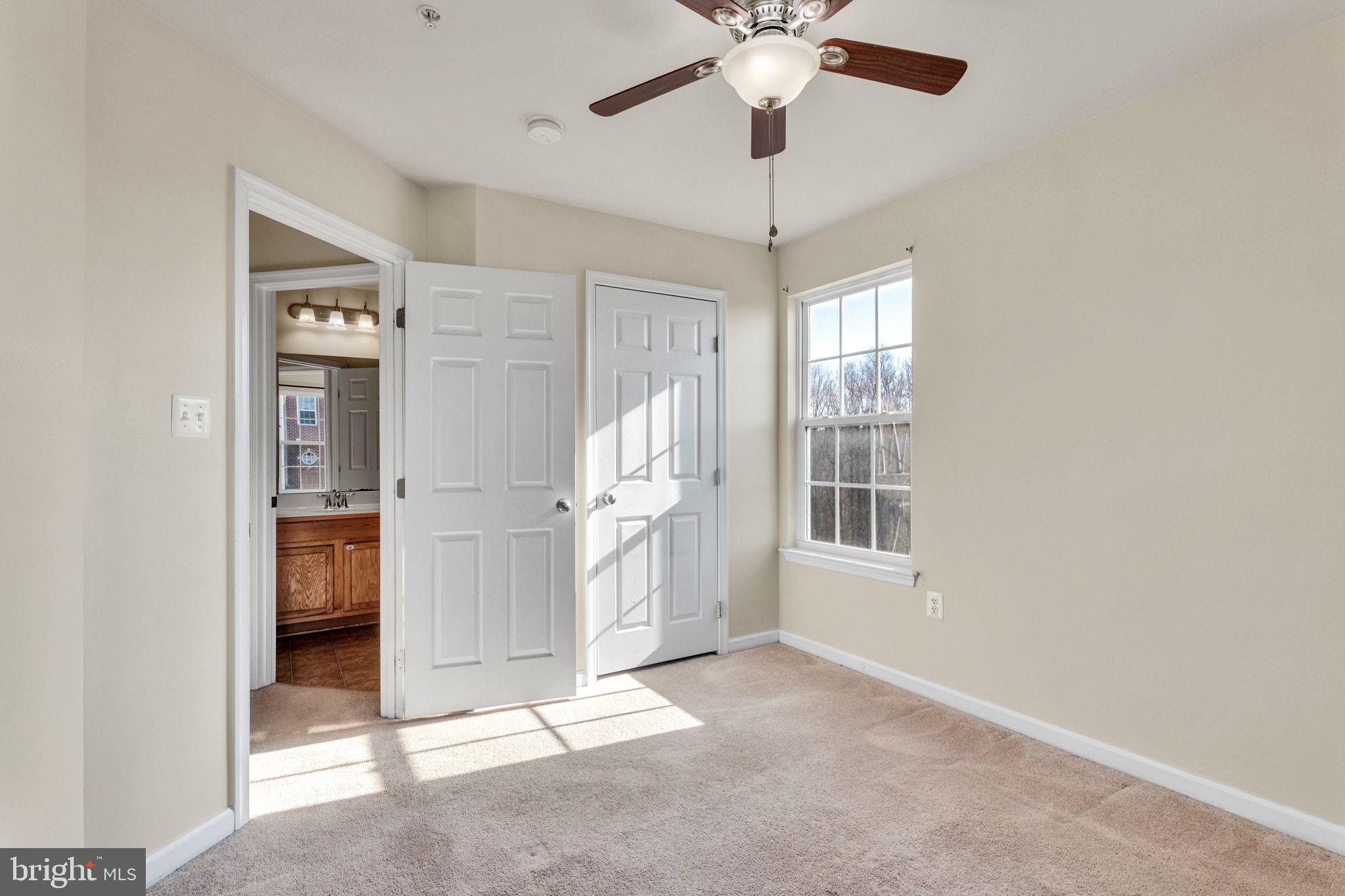 25501 Joy Lane Damascus, MD 20872 - Photo 29 of 35 wooden floor in an empty room with a window