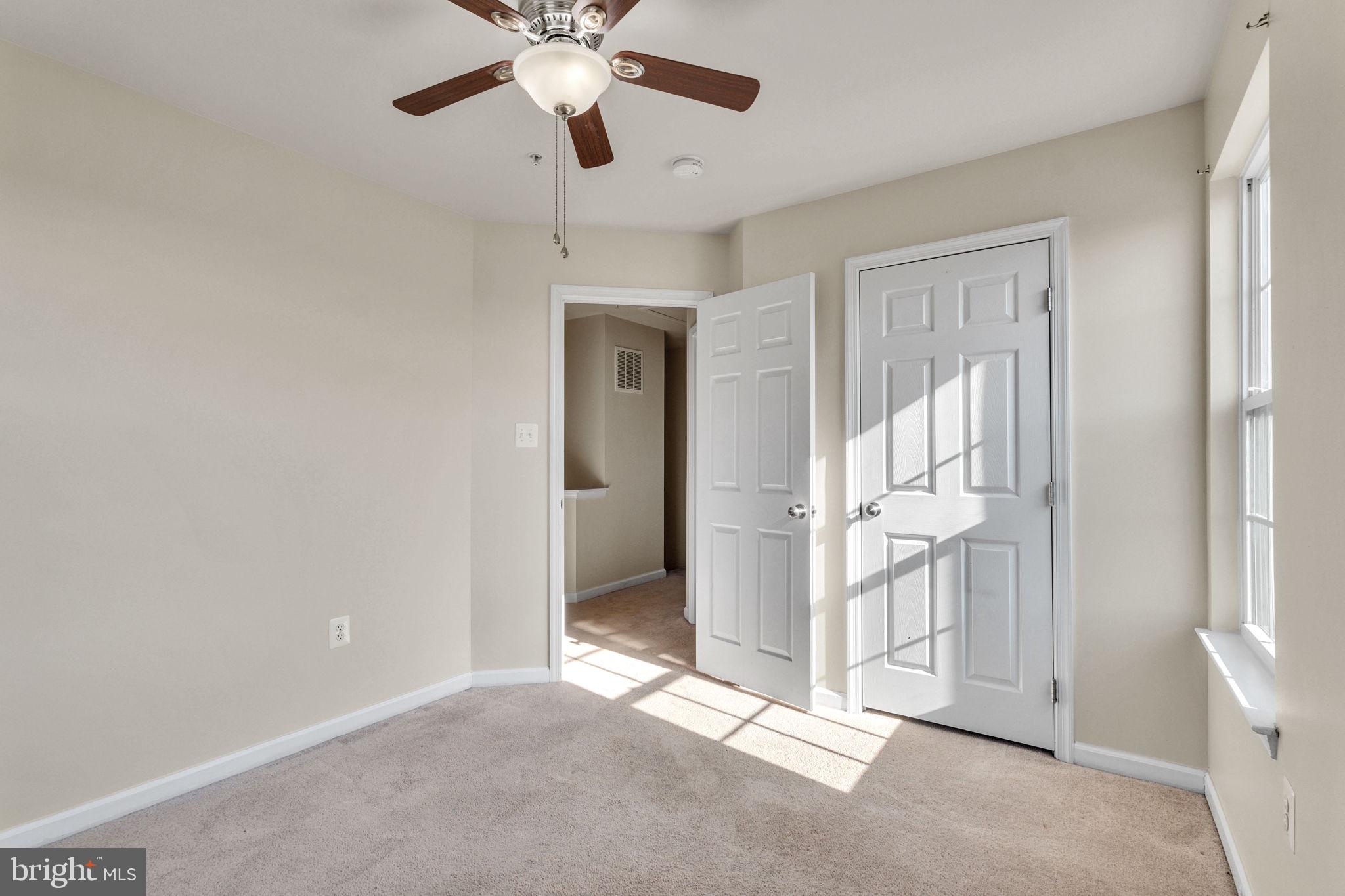 25501 Joy Lane Damascus, MD 20872 - Photo 30 of 35 en empty room with fan and a ceiling fan