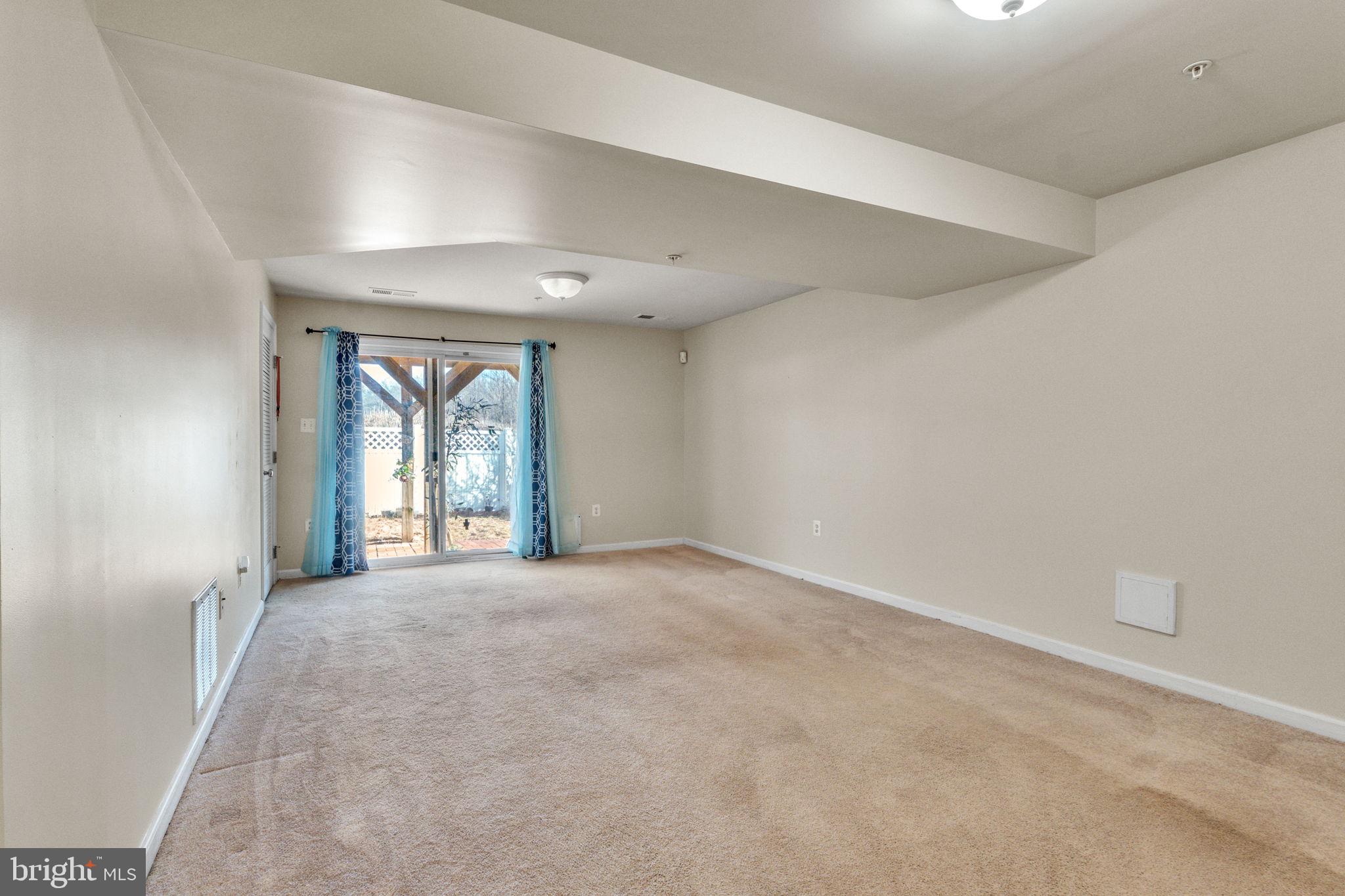 25501 Joy Lane Damascus, MD 20872 - Photo 3 of 35 a view of an empty room with a window