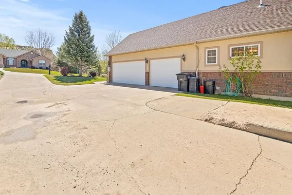 a dining room with furniture a rug and wooden floor
