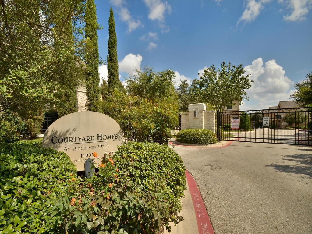 11000 Anderson Mill Road, Unit 93 Austin, TX 78750 - Photo 21 of 27 Gated entry welcomes residents to the exclusive Courtyard Homes at Anderson Oaks.