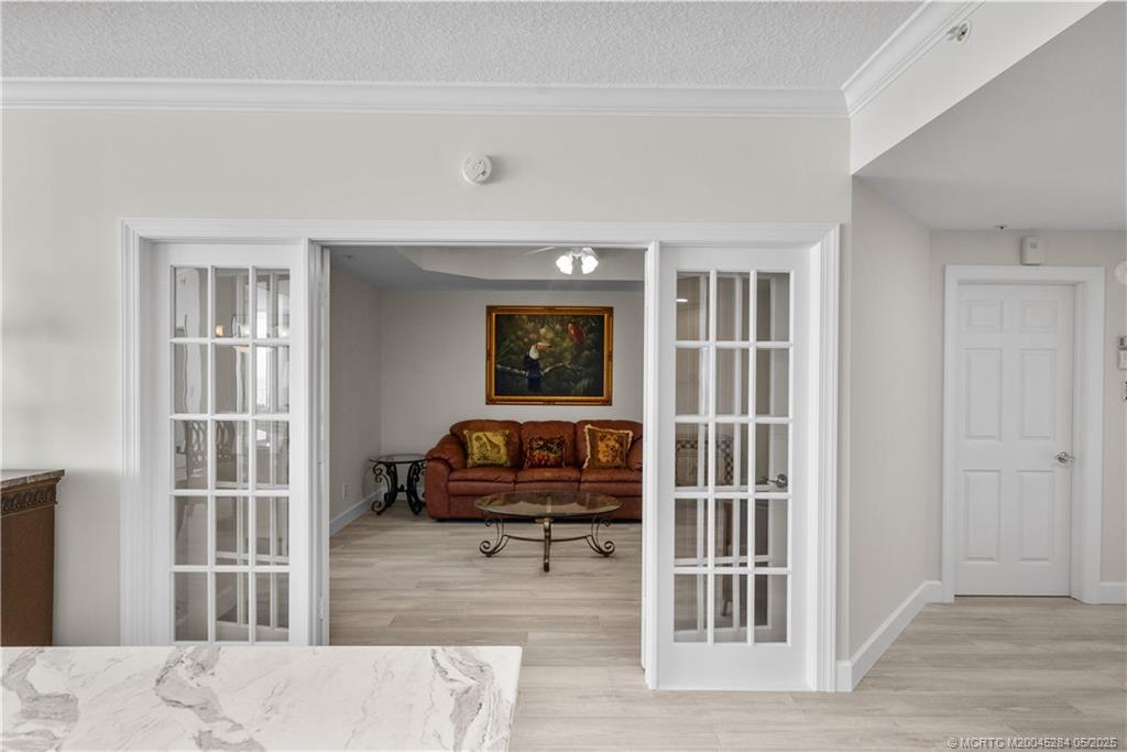 8600 South Ocean Drive, Unit PH5 Jensen Beach, FL 34957 - Photo 19 of 49 a living room with a couch and a window