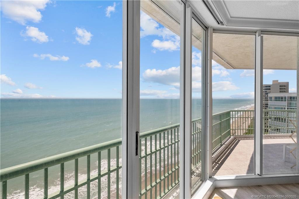 8600 South Ocean Drive, Unit PH5 Jensen Beach, FL 34957 - Photo 23 of 49 a view of a glass door with a from a window