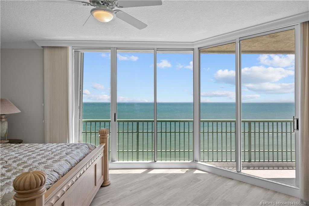 8600 South Ocean Drive, Unit PH5 Jensen Beach, FL 34957 - Photo 24 of 49 a bedroom with a balcony