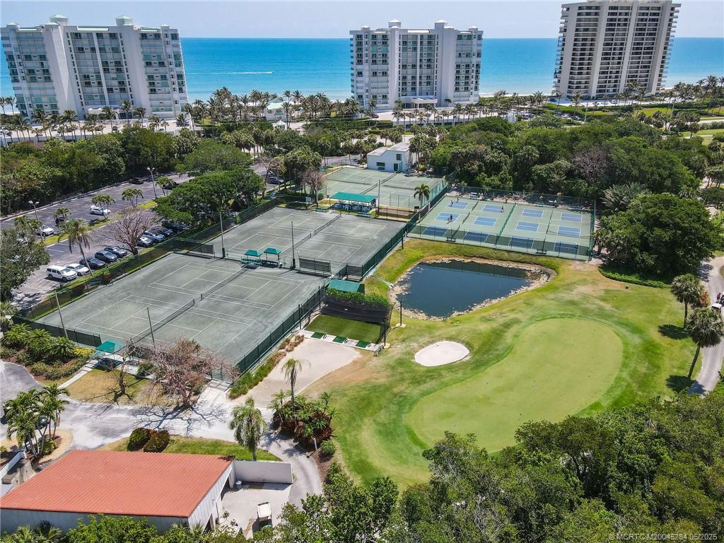 8600 South Ocean Drive, Unit PH5 Jensen Beach, FL 34957 - Photo 36 of 49 an aerial view of residential houses with outdoor space