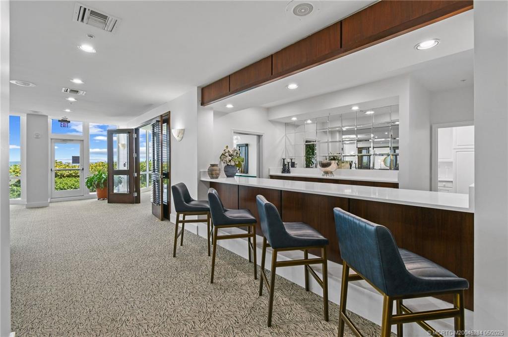 8600 South Ocean Drive, Unit PH5 Jensen Beach, FL 34957 - Photo 41 of 49 a dining room with furniture and window
