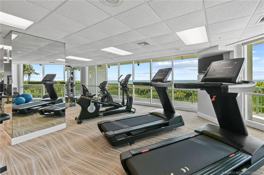 8600 South Ocean Drive, Unit PH5 Jensen Beach, FL 34957 - Photo 48 of 49 a view of a room with gym equipment