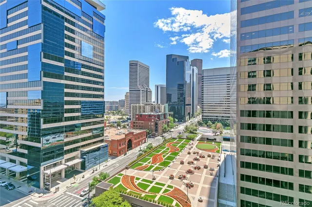 a view of a city with tall buildings