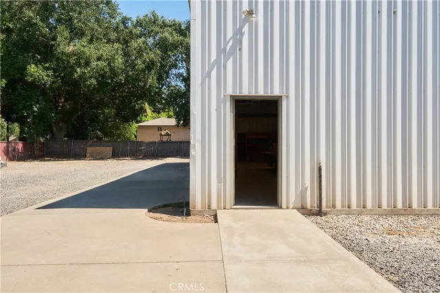 a room with a toilet and a window