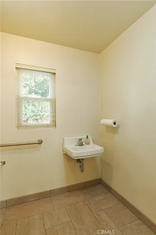a view of a kitchen with a sink