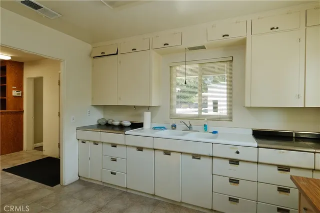 a room with a fireplace and a fireplace