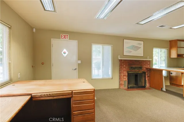 a kitchen with stainless steel appliances granite countertop a stove and a sink
