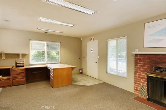 view of living room with furniture and window