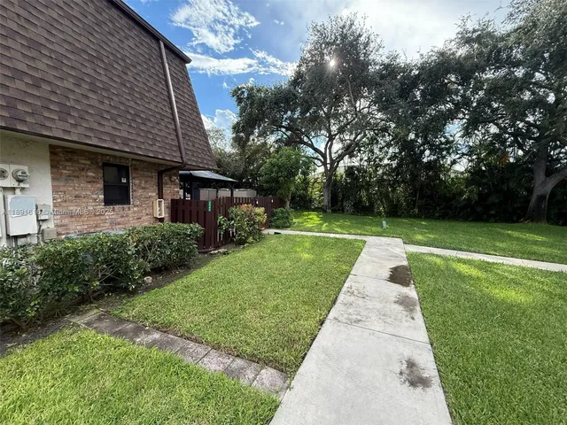 a view of a backyard with a garden