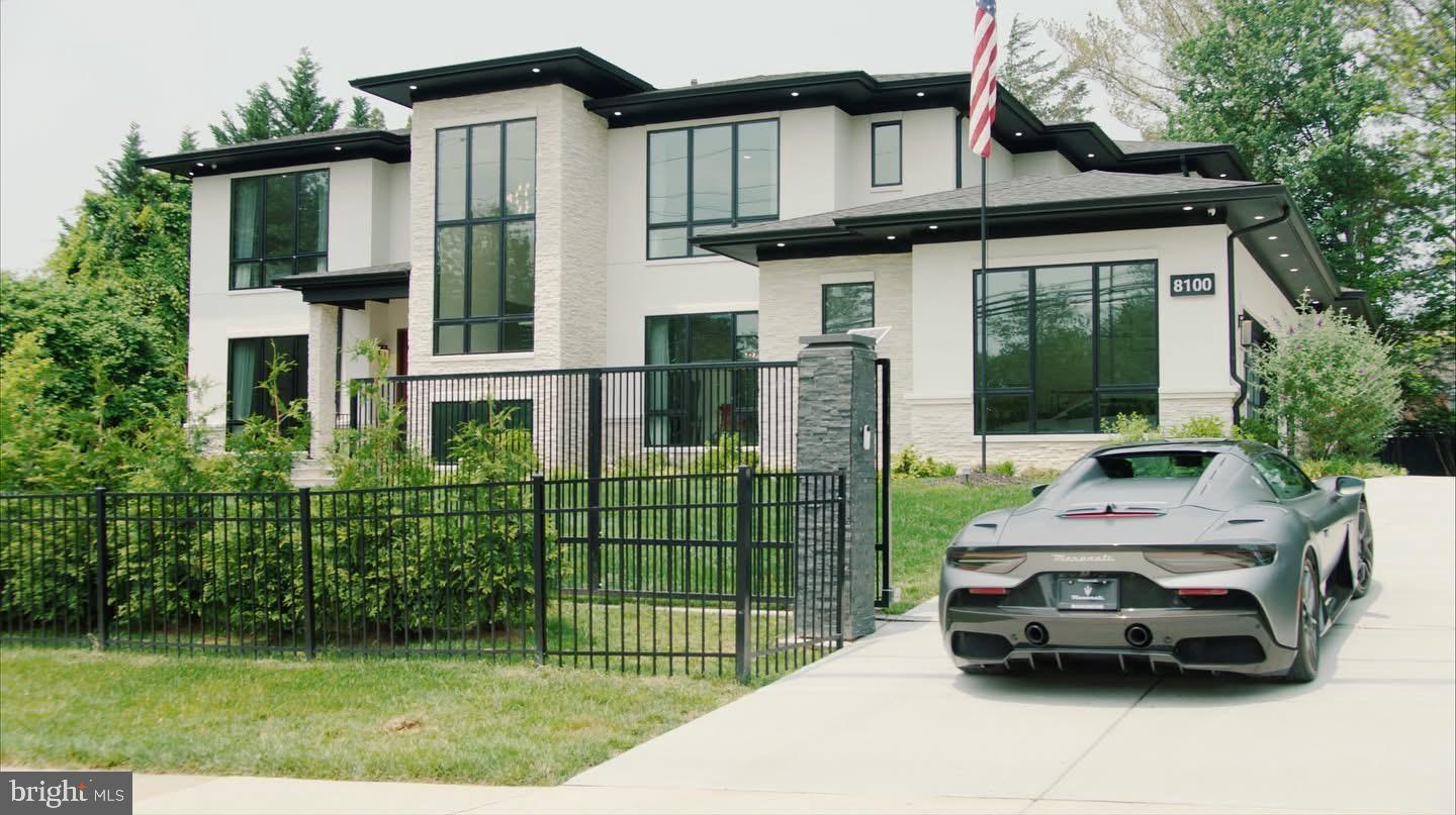 8100 Lewinsville Road McLean, VA 22102 - Photo 1 of 49 a car parked in front of a house