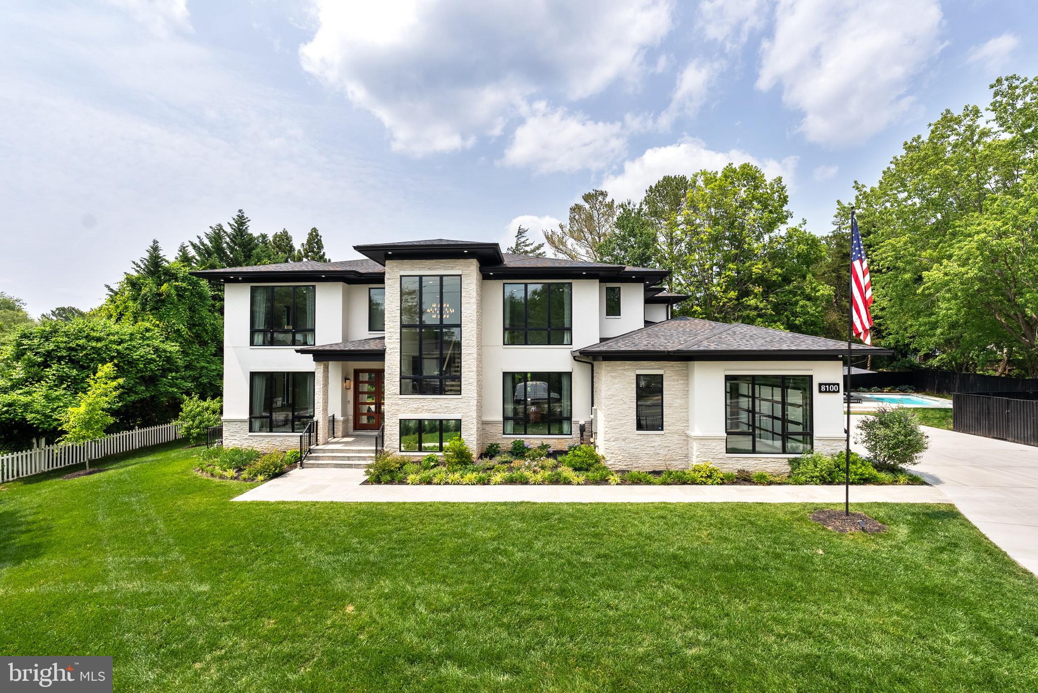 8100 Lewinsville Road McLean, VA 22102 - Photo 11 of 49 a front view of house with yard and green space