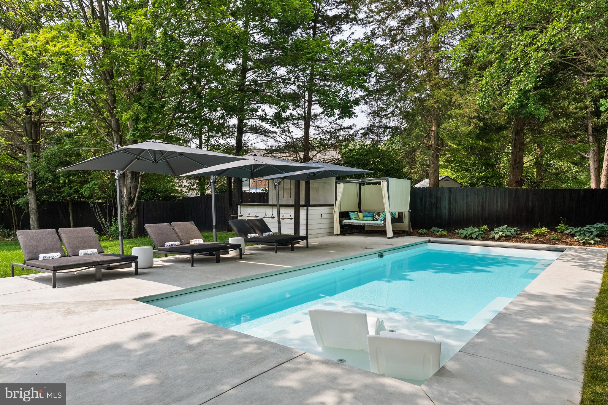 8100 Lewinsville Road McLean, VA 22102 - Photo 12 of 49 a view of a patio with chairs and plants