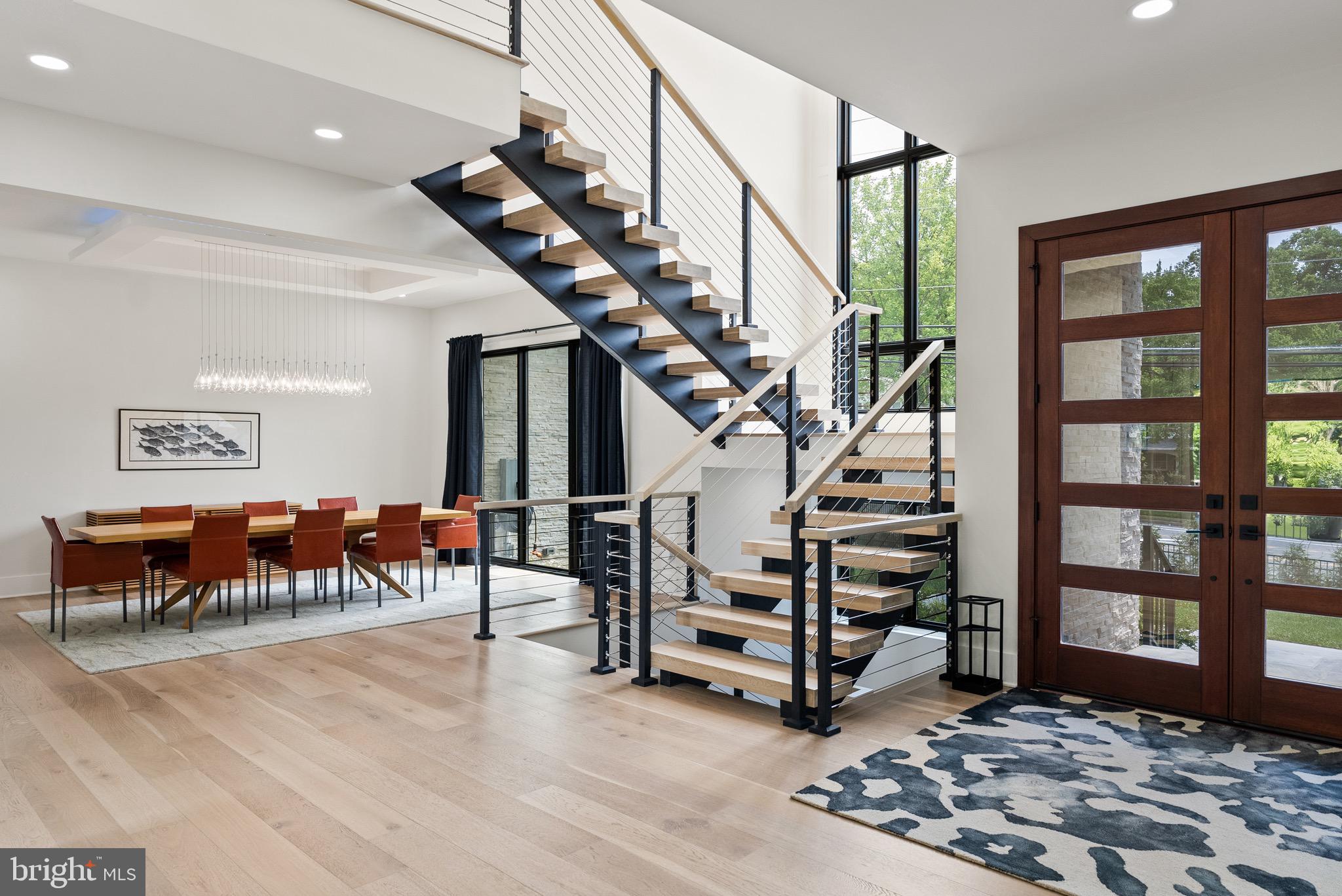8100 Lewinsville Road McLean, VA 22102 - Photo 14 of 49 a view of entryway wih livingroom and stairs