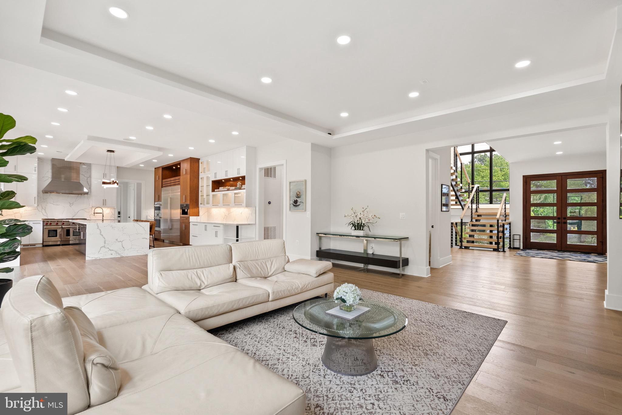 8100 Lewinsville Road McLean, VA 22102 - Photo 21 of 49 a living room with furniture and wooden floor