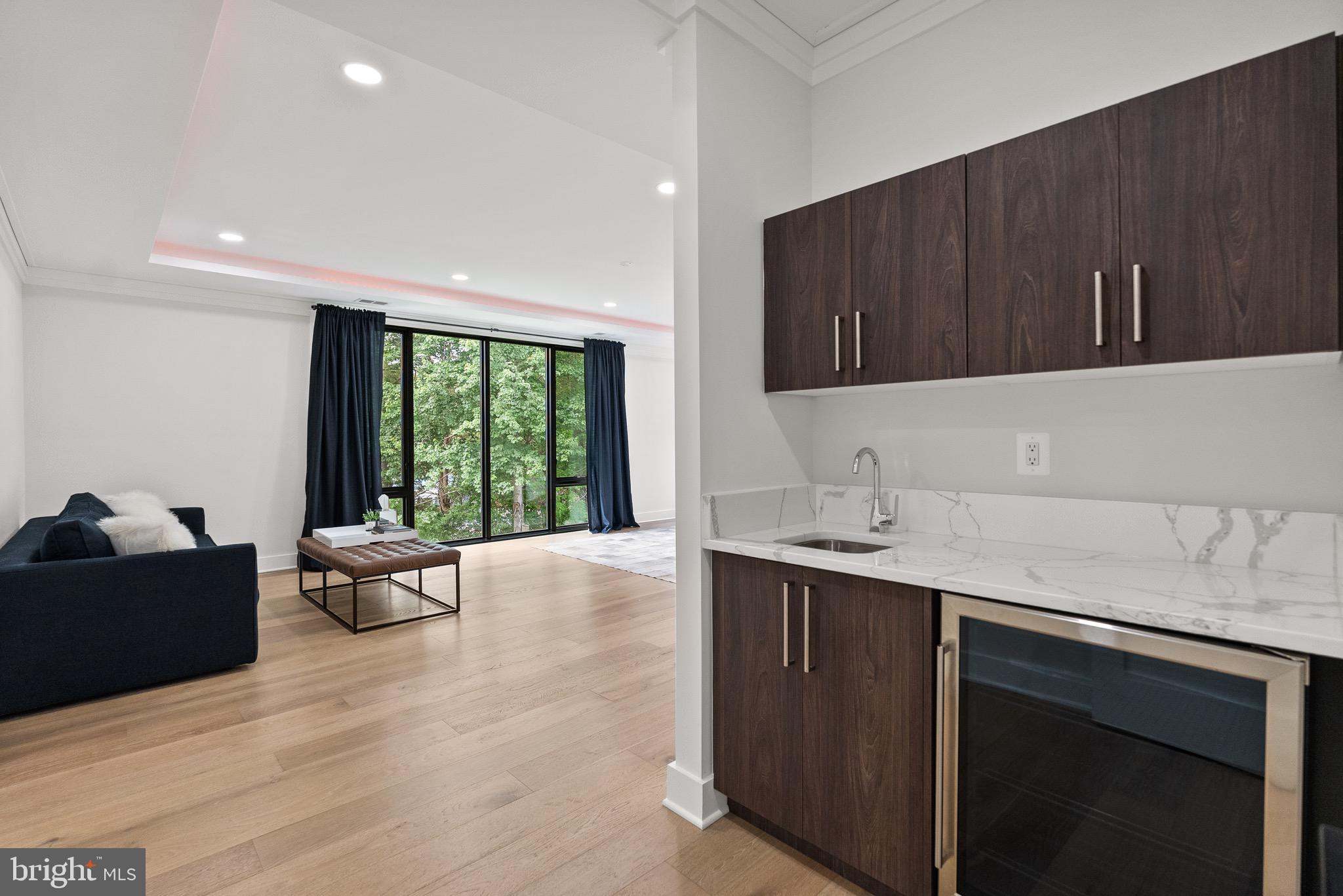 8100 Lewinsville Road McLean, VA 22102 - Photo 32 of 49 a kitchen with a sink and a stove top oven