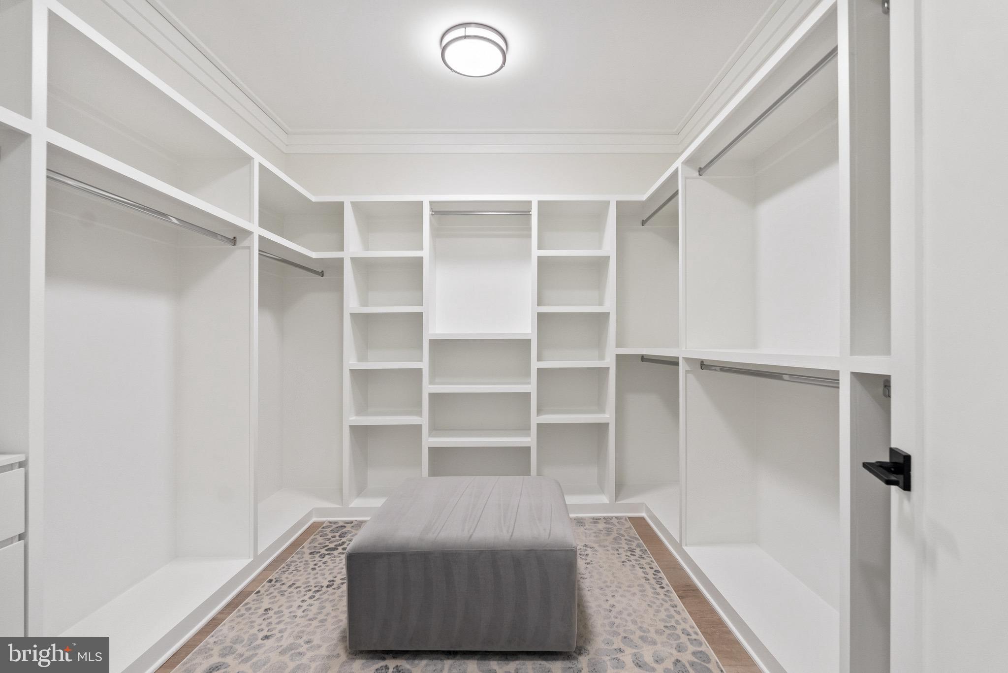 8100 Lewinsville Road McLean, VA 22102 - Photo 39 of 49 a living room with a bed and a window