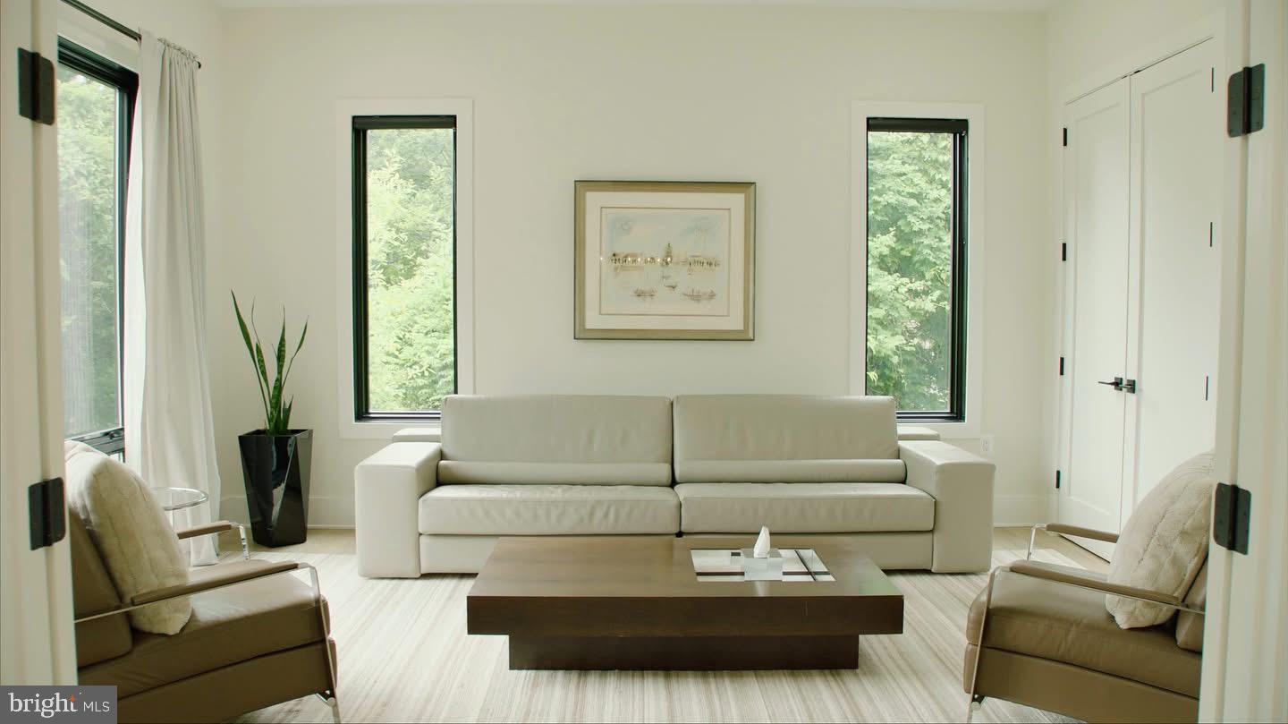 8100 Lewinsville Road McLean, VA 22102 - Photo 5 of 49 a living room with furniture and a large window