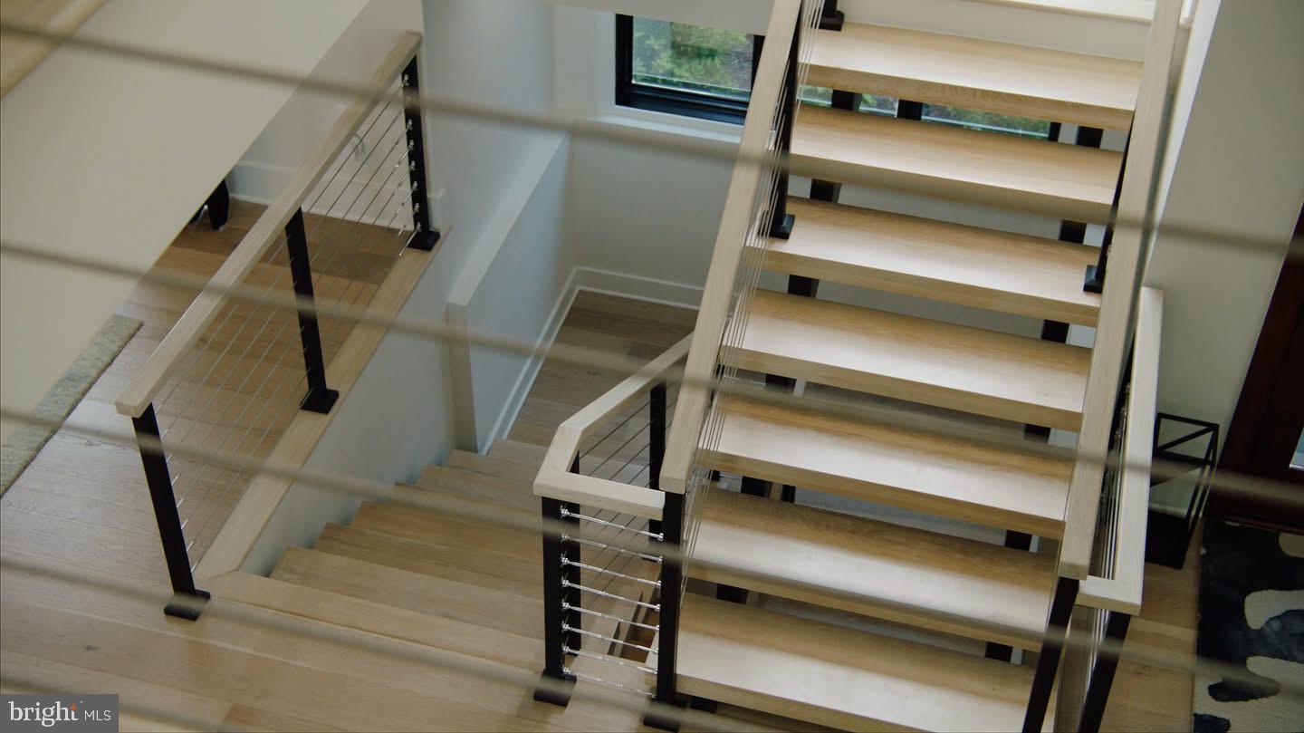 8100 Lewinsville Road McLean, VA 22102 - Photo 7 of 49 a view of walk in closet with clothes and shoes