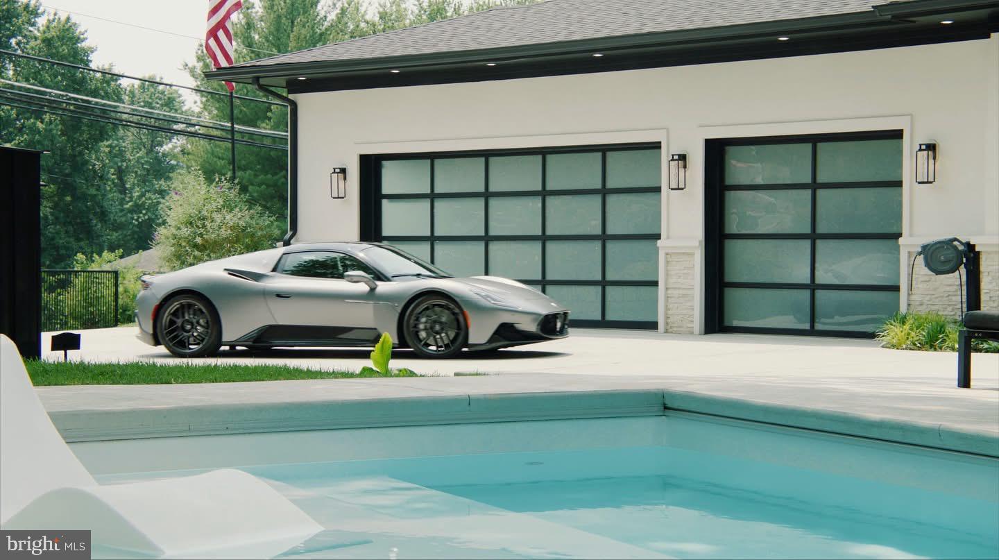 8100 Lewinsville Road McLean, VA 22102 - Photo 9 of 49 a car parked in front of a house