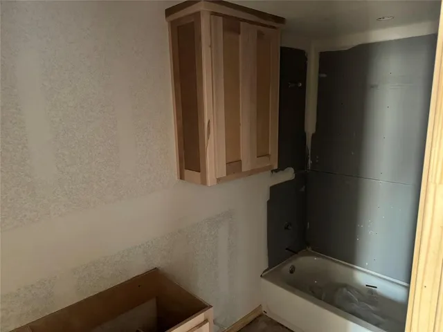 view of backyard with tub