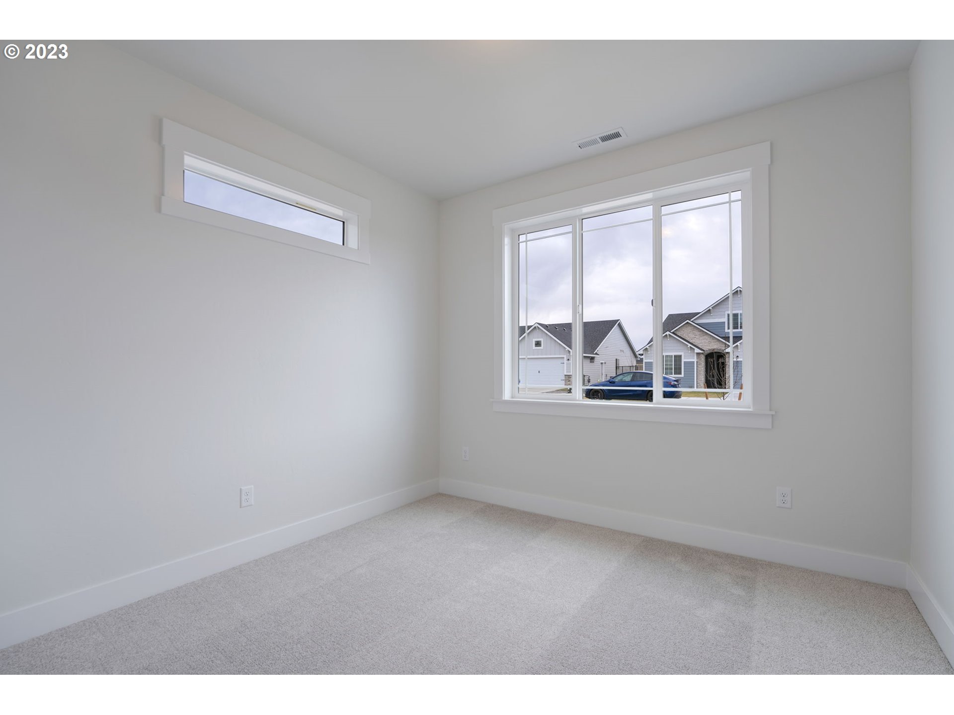 318 Sage Street Boardman, OR 97818 - Photo 3 of 20 a view of an empty room with a window