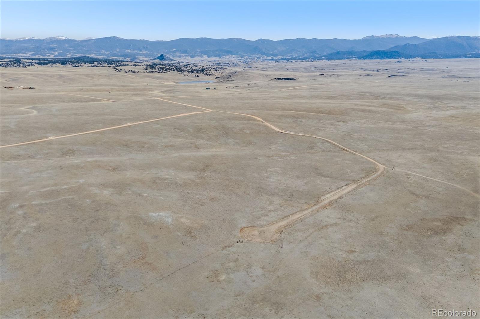 3179 Rhyolite Drive Como, CO 80432 - Photo 13 of 28 a view of an lake and a mountain