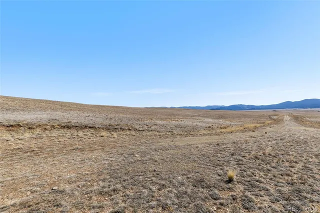 a view of ocean and mountain